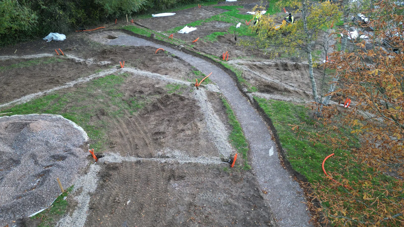 An aerial view of a garden being built.